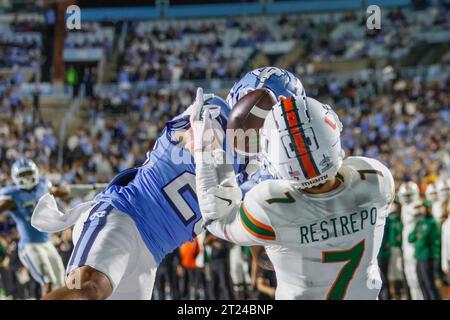 Chapel Hill, NC USA: Miami Hurricanes wide receiver Xavier Restrepo (7) attempts to make a reception while covered by North Carolina Tar Heels defensi Stock Photo