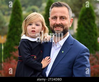 Podolany, Poland. 15th Oct, 2023. Wladyslaw Kosiniak-Kamysz (R), president of PSL and co-leader of Trzecia Droga poses with his daughter in front of the polling station. Credit: SOPA Images Limited/Alamy Live News Stock Photo