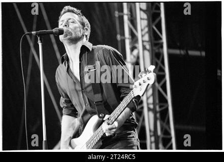 BRYAN ADAMS, CARDIFF, 2002: Bryan Adams playing an open air concert live at Cooper's Field in Cardiff, Wales, UK on 21 July 2002. The Canadian rocker was touring with his Spirit: Stallion of the Cimarron album. Photo: Rob Watkins Stock Photo