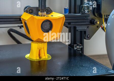 Printed on a 3D printer with yellow filament. Stock Photo