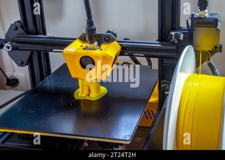 Printed on a 3D printer with yellow filament. Stock Photo