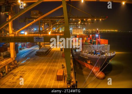 Night view of Chittagong Port. It is the main seaport of Bangladesh. Located in Bangladesh's port city of Chittagong and on the banks of the Karnaphul Stock Photo