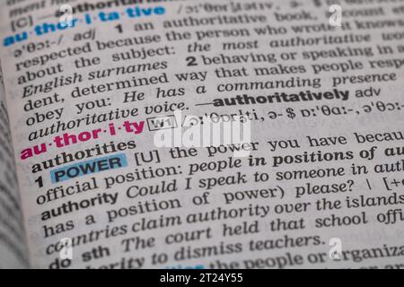 Authority word in the dictionary. Power or control or command concept background photo. Stock Photo