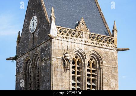 Close-up of the paratrooper dummy hung from the steeple of Sainte-Mere-Eglise's church in homage to what private John Steele went through on D Day. Stock Photo