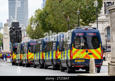 London, UK. Police vans from the City of London Police Support Group and the Territorial Support Group lined up in Whitehall, Westminster, 15th Oct.. Stock Photo