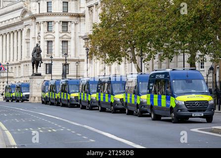 London, UK. Police vans from the City of London Police Support Group and the Territorial Support Group lined up in Whitehall, Westminster, 15th Oct.. Stock Photo