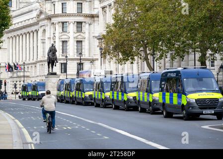 London, UK. Police vans from the City of London Police Support Group and the Territorial Support Group lined up in Whitehall, Westminster, 15th Oct.. Stock Photo