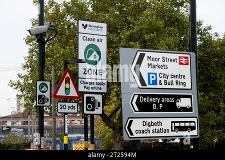 A clutter of road signs including a clean air zone sign, Birmingham, West Midlands, England, UK Stock Photo