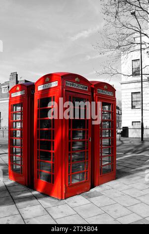 Color isolated red phone booths in London on black and white ...