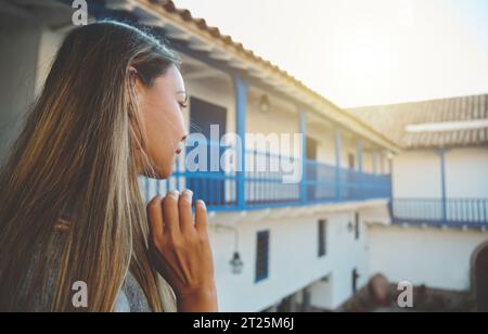 Woman Exploring Regional Historical Museum Walking at Garcilaso de la Vega Inca House in Cusco, Peru Stock Photo