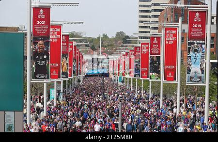 Crystal Palace & Chelsea fans on Olympic Way or Wembley Way ahead of the match. - Chelsea v Crystal Palace, The Emirates FA Cup Semi Final, Wembley Stadium, London - 17th April 2022 Editorial Use Only Stock Photo