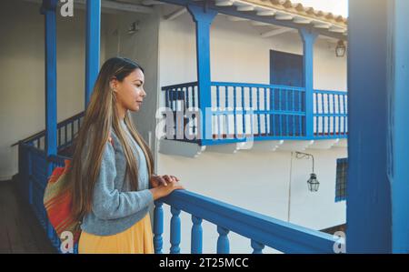 Woman Exploring Regional Historical Museum Walking at Garcilaso de la Vega Inca House in Cusco, Peru Stock Photo