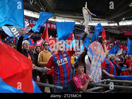 Crystal Palace fans holding aloft a home made FA Cup Trophy and