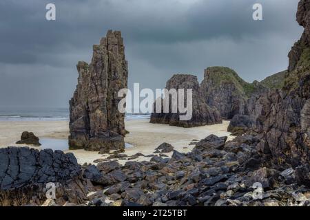 Garry Beach is a beautiful white sand beach with spectacular sea stacks and caves on the Isle of Lewis in the Outer Hebrides of Scotland. Stock Photo