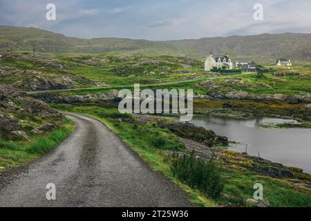 Ardslave is a beautiful coastal village on the Isle of Harris, connected by single-track roads that wind through small lochs and stunning scenery. Stock Photo