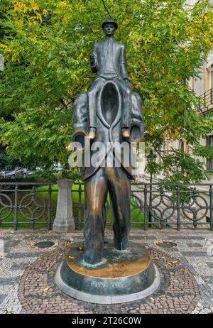 Franz Kafka monument, created by Jaroslav Rona, next to Spanish Synagogue, Josefov, historic Jewish Quarter, Prague, Czech Republic Stock Photo