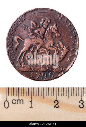 An ancient English copper coin halfpenny with the image of a sailboat and St. George. Reverse. Isolated on white Stock Photo