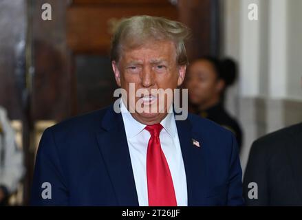 October 17, 2023, New York, New York, USA: Former President Donald Trump arrives and talks to the media as he enters the courtroom during the 3rd week of his NYS civil fraud case in the NYS Supreme Courthouse. (PHOTO: Andrea RENAULT/Zuma Press) (Credit Image: © Andrea Renault/ZUMA Press Wire) EDITORIAL USAGE ONLY! Not for Commercial USAGE! Stock Photo