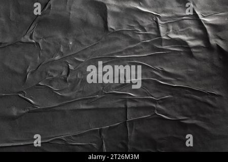Glued black paper poster texture background Stock Photo