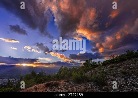 the setting sun colors the clouds red. Maiella National Park, Abruzzo, Italy, Europe Stock Photo