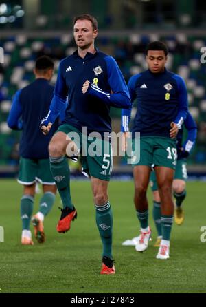 Northern Ireland’s Jonny Evans warms up ahead of the UEFA Euro 2024 qualifying match at Windsor Park, Belfast. Picture date: Tuesday October 17, 2023. Stock Photo