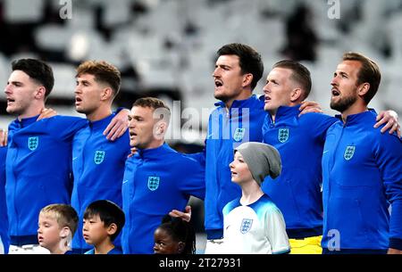 (left to right) England's Declan Rice, John Stones, Kieran Trippier, Harry Maguire, goalkeeper Jordan Pickford and Harry Kane sing the England national anthem before the UEFA Euro 2024 qualifying match at Wembley Stadium, London. Picture date: Tuesday October 17, 2023. Stock Photo