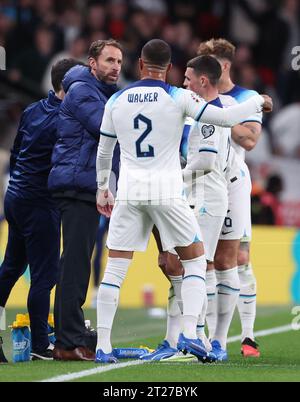 London, UK. 17th Oct, 2023. Gareth Southgate manager of England talks with Kyle Walker and Phil Foden of England during the UEFA European Championship Qualifying match at Wembley Stadium, London. Picture credit should read: David Klein/Sportimage Credit: Sportimage Ltd/Alamy Live News Stock Photo