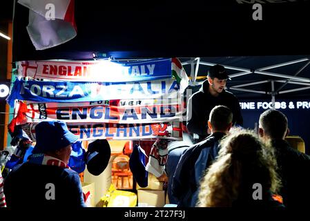 A street vendor sells merchandise ahead of the UEFA Euro 2024 qualifying match between England and Italy at Wembley Stadium, London. Picture date: Tuesday October 17, 2023. Stock Photo