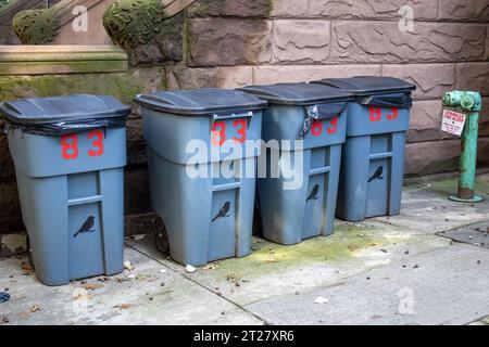trash cans with number 83 in red Stock Photo