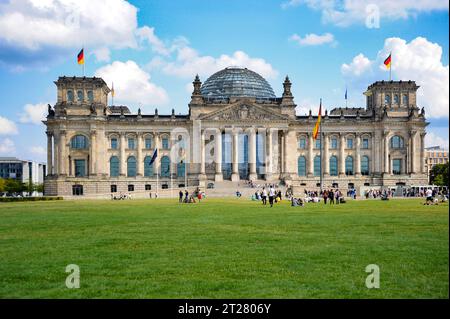 The German parliament is currently housed at the Reichstag, a globally recognizable symbol of democracy. Stock Photo