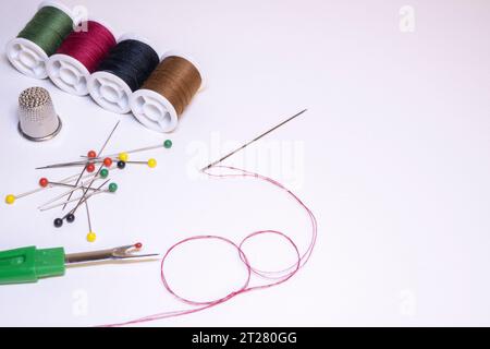 Sewing tools on a light background. Stock Photo