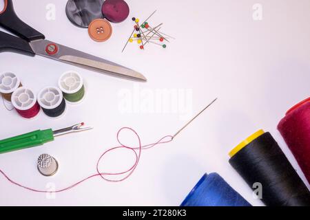 Sewing tools on a light background. Stock Photo