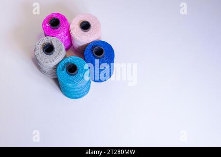Large colorful threads on a light background. Stock Photo