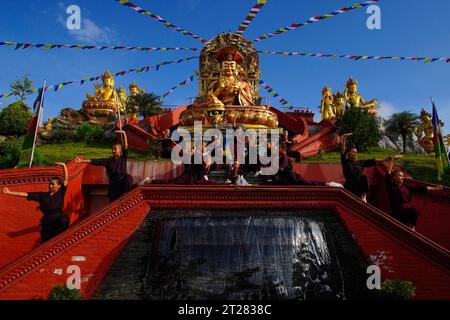 Ramkot, Nepal. 18th Aug, 2023. Novices practice martial arts in front of a statue depicting Kunkhyen Pema Karpo (1527C1592), the fourth Gyalwang Drukpa, spiritual head of the Drukpa order. (Credit Image: © Skanda Gautam/ZUMA Press Wire) EDITORIAL USAGE ONLY! Not for Commercial USAGE! Stock Photo