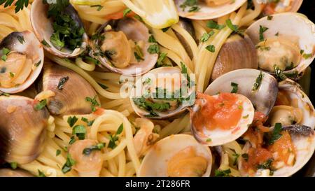 Traditional italian seafood pasta with clams Spaghetti alle Vongole. Stock Photo