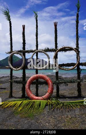 Ceremonial Decoration with Wreaths made from Shell Money with Mount Tavurvur, PNG, as a Backdrop Stock Photo