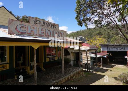 Vintage wooden stores of Chemist, Butcher and The Farmer’s Store in historical village outdoor museum in Herberton, Queensland, Australia Stock Photo