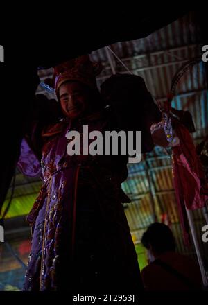 Chinese Opera actor prepares at backstage for performance. Stock Photo