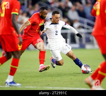 October 17, 2023: Nashville, Tennessee, USA: United States defender Sergio Dest (2) works against Ghana forward Jordan Ayew (9) during an international friendly soccer match between the United States Men's National Team and Ghana on October 17, 2023 in Nashville. (Credit Image: © Scott Coleman/ZUMA Press Wire) EDITORIAL USAGE ONLY! Not for Commercial USAGE! Stock Photo