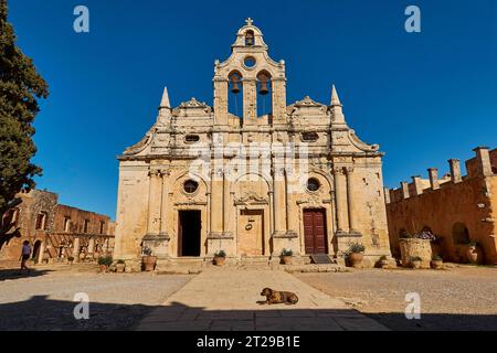 Super wide angle, main church, facade, dog lying on forecourt, blue cloudless sky, Arkadi Monastery, Rethimnon Province, Crete, Greece Stock Photo