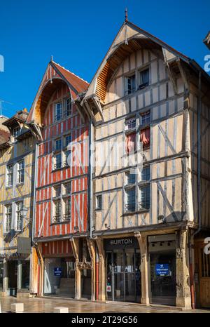 Shops and businesses housed in ancient medieval buildings in Rue Louis Ulbach, Troyes, Aube, France Stock Photo