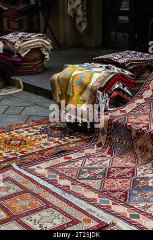 Colorful handmade carpets on street in Morocco in Old Tbilisi bazaar in Georgia Stock Photo