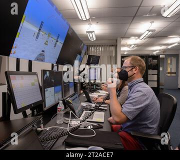 AFCM subproject FAA-2 flight test team member Thomas Lombaerts operates the Vertical Motion Simulator (VMS) control room N243 during a simulation for automated flight and contingency management in urban air mobility. Stock Photo