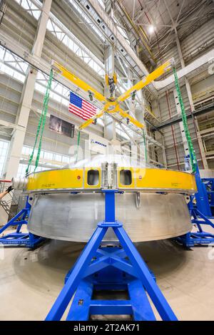 . These images and videos show technicians at NASA’s Michoud Assembly Facility in New Orleans lifting and installing the liquid oxygen dome weld confidence article for a future upper stage for NASA’s SLS (Space Launch System) rocket onto the LTAC (LOX Tank Assembly Center) in Building 115 at Michoud for the next phase of manufacturing in July 2023.  The dome makes up a portion of the liquid oxygen tank weld confidence article for the EUS (exploration upper stage). Teams use weld confidence articles to verify welding procedures and structural integrity of the welds to manufacture structural tes Stock Photo