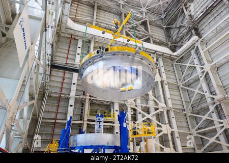 . These images and videos show technicians at NASA’s Michoud Assembly Facility in New Orleans lifting and installing the liquid oxygen dome weld confidence article for a future upper stage for NASA’s SLS (Space Launch System) rocket onto the LTAC (LOX Tank Assembly Center) in Building 115 at Michoud for the next phase of manufacturing in July 2023.  The dome makes up a portion of the liquid oxygen tank weld confidence article for the EUS (exploration upper stage). Teams use weld confidence articles to verify welding procedures and structural integrity of the welds to manufacture structural tes Stock Photo