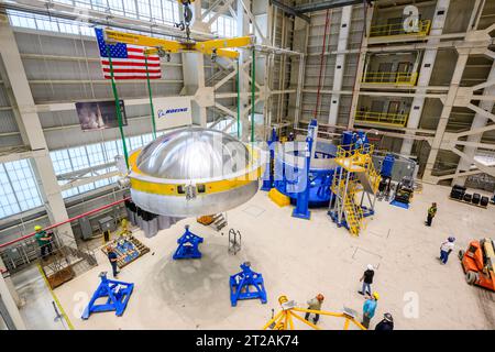 . These images and videos show technicians at NASA’s Michoud Assembly Facility in New Orleans lifting and installing the liquid oxygen dome weld confidence article for a future upper stage for NASA’s SLS (Space Launch System) rocket onto the LTAC (LOX Tank Assembly Center) in Building 115 at Michoud for the next phase of manufacturing in July 2023.  The dome makes up a portion of the liquid oxygen tank weld confidence article for the EUS (exploration upper stage). Teams use weld confidence articles to verify welding procedures and structural integrity of the welds to manufacture structural tes Stock Photo