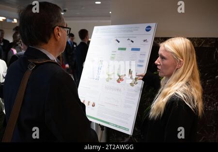 2023 DEVELOP Day. Students and young professionals discuss their projects during the 2023 DEVELOP Day, Wednesday, Aug. 9, 2023, at the Mary W. Jackson NASA Headquarters building in Washington. Every summer students and young professionals from NASA’s Applied Sciences’ DEVELOP National Program come to NASA Headquarters to present their research. This year marks the 25th year of DEVELOP, a training and development program where students work on Earth science research projects, mentored by science advisors from NASA and partner agencies, and extend research results to local communities. Stock Photo