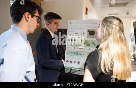 2023 DEVELOP Day. Students and young professionals discuss their projects during the 2023 DEVELOP Day, Wednesday, Aug. 9, 2023, at the Mary W. Jackson NASA Headquarters building in Washington. Every summer students and young professionals from NASA’s Applied Sciences’ DEVELOP National Program come to NASA Headquarters to present their research. This year marks the 25th year of DEVELOP, a training and development program where students work on Earth science research projects, mentored by science advisors from NASA and partner agencies, and extend research results to local communities. Stock Photo