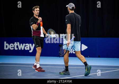 Antwerp, Belgium. 18th Oct, 2023. French Edouard Roger-Vasselin and Mexican Santiago Gonzalez pictured in action during a second round doubles match at the European Open Tennis ATP tournament, in Antwerp, Wednesday 18 October 2023. BELGA PHOTO JASPER JACOBS Credit: Belga News Agency/Alamy Live News Stock Photo