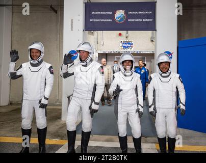 NASA’s SpaceX Crew-7 Live Launch Coverage. NASA’s SpaceX Crew-7 crew members, from left, Roscosmos cosmonaut Konstantin Borisov, ESA (European Space Agency) astronaut Andreas Mogensen, NASA astronaut Jasmin Moghbeli, and JAXA (Japan Aerospace Exploration Agency) astronaut Satoshi Furukawa acknowledge family and friends on Saturday, Aug. 26, 2023, outside of the Neil Armstrong Operations and Checkout Building at NASA’s Kennedy Space Center in Florida. Next, they will get into the customized Tesla Model X vehicles that will transport them to Kennedy’s Launch Complex 39A. SpaceX’s Dragon spacecra Stock Photo